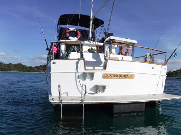 Mikes launch Samudra anchored off one of the many tiny islands found along the Coromandel peninsular. Samudra is a word found in several languages and means the gathering of waters.