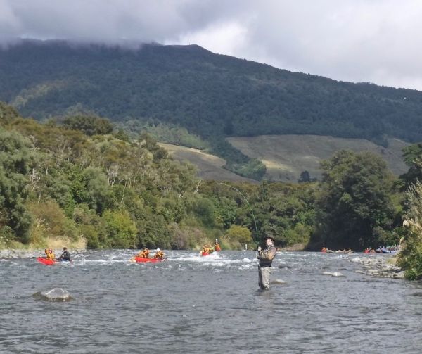 Peter hooked up this morning as a flotilla of canoes paddled through.