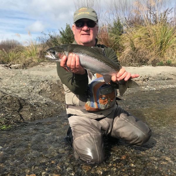 Mike with one of over two dozen fish caught between four of them a day or two ago on the TT. He always gets an erection in his little pinkie when he's excited.